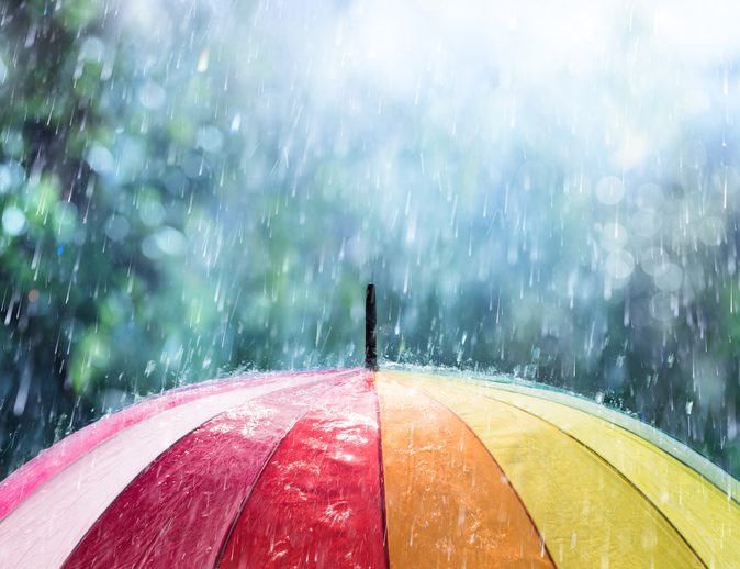 Rain On Rainbow Umbrella iStock